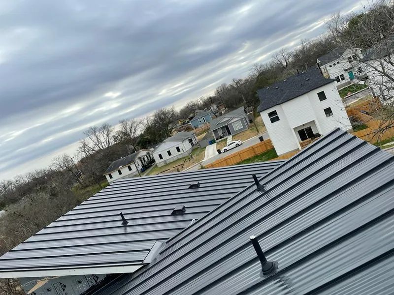 Standing seam metal roof panels with vents for Skylight Repair in Pleasant View